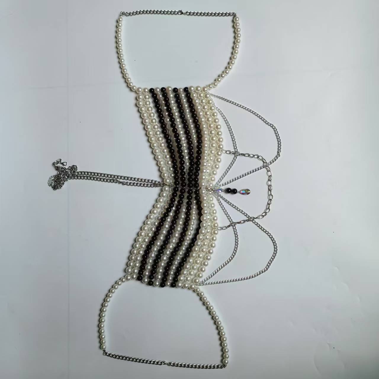 Black White Woven Plastic Pear - Body Jewelry Vest recension och pris